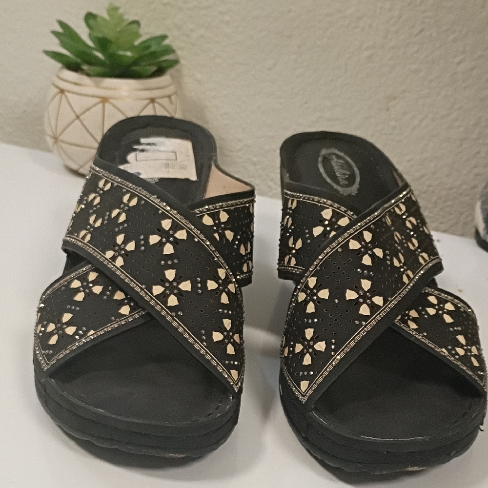 Stylish Black and Cream Mules by Clarks